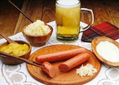 Sausages with mustard and beer clipart