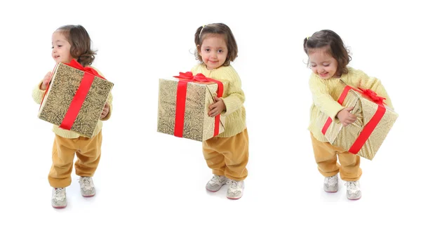 Toddler with a christmas gift — Stock Photo, Image