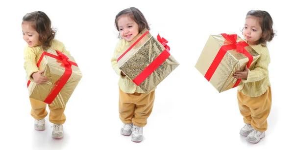 Bambino con un regalo di Natale — Foto Stock