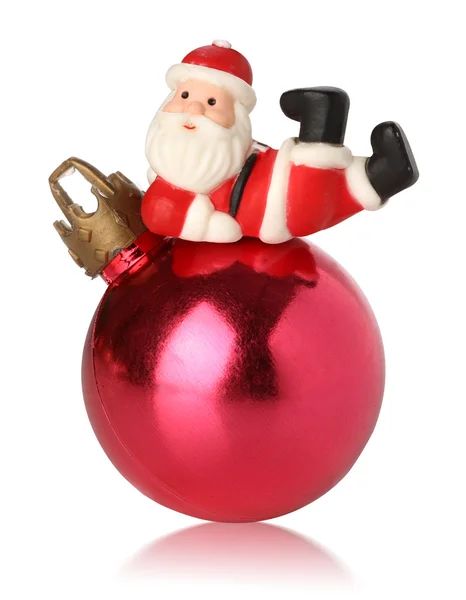 Santa αναπαύεται πάνω από μια μπάλα Χριστούγεννα — Φωτογραφία Αρχείου