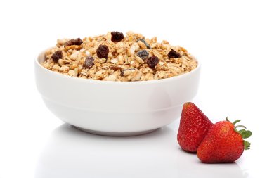 bir kase içinde beyaz arka plan üzerinde granola Kahvaltı