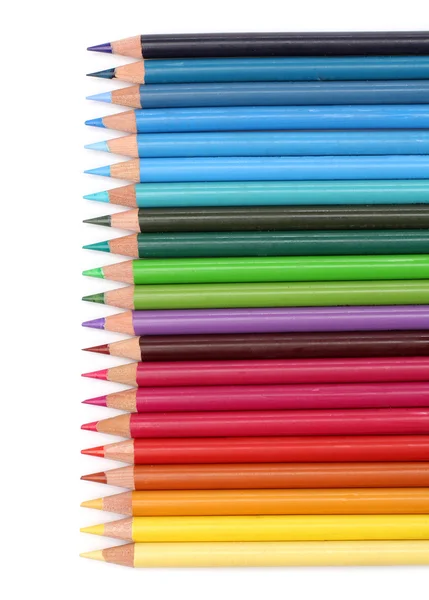 Barevné tužky nad bílým pozadím — Stock fotografie