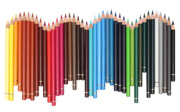Barevné tužky nad bílým pozadím — Stock fotografie