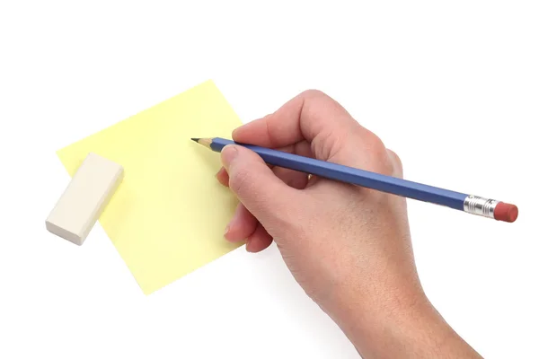 Hand met een blauwe potlood schrijven — Stockfoto