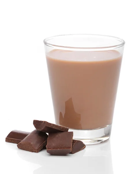 Glass of chocolate milk with broken chocolate bars — Stock Photo, Image