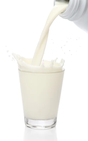 Láhev nalil do sklenice mléka. Splash — Stock fotografie