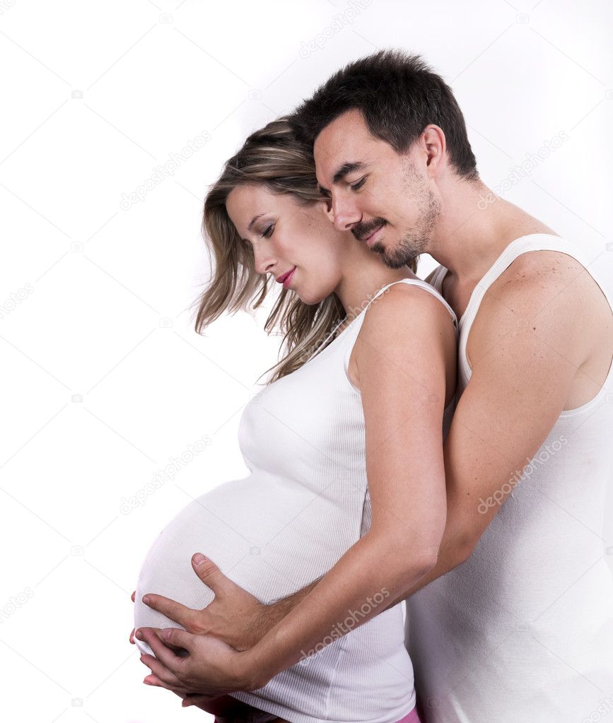 Young parents, pregnant mother and father together