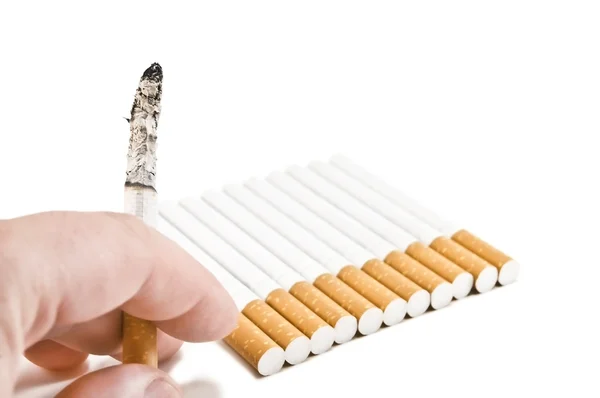 Cigarette in hand — Stock Photo, Image