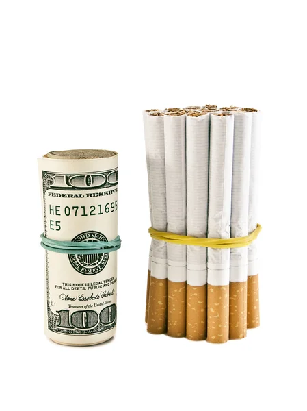 Dollárt, és a cigaretta — Stock Fotó