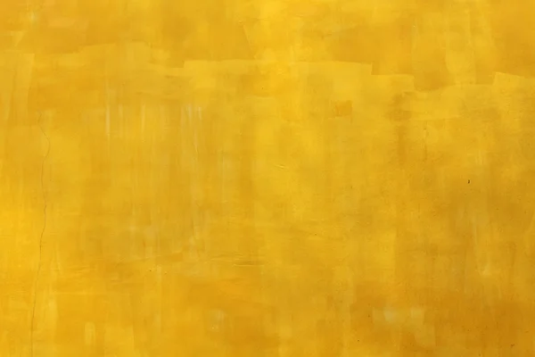 stock image A yellow painted wall with retro effects