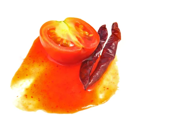 Cut tomato red chili and sauce — Stock Photo, Image
