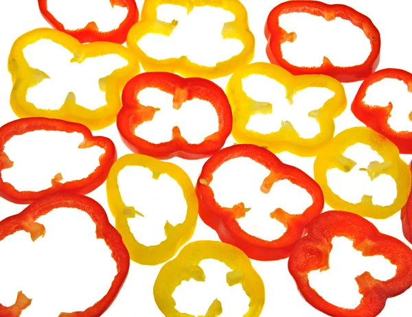 Slices of red and yellow capsicum — Stock Photo, Image