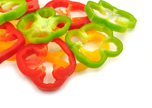 Slices of colorful capsicums — Stock Photo, Image