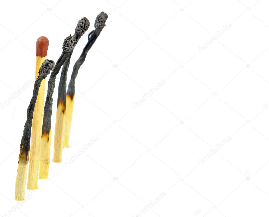 Row of burnt and unburnt match sticks