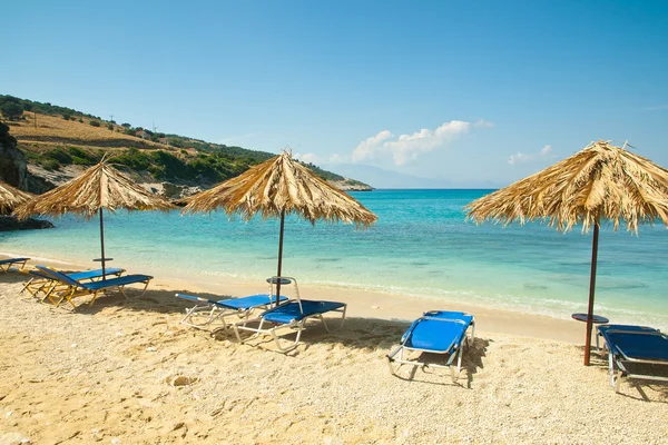 stock image Beautiful beach view with sunbeds and umbrellas at Xigia beach