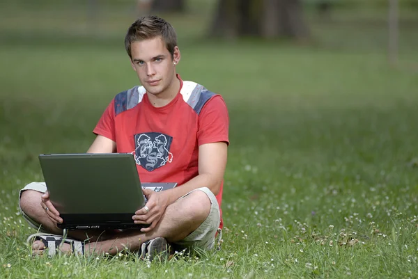 Young man with notebook — Stock Photo, Image