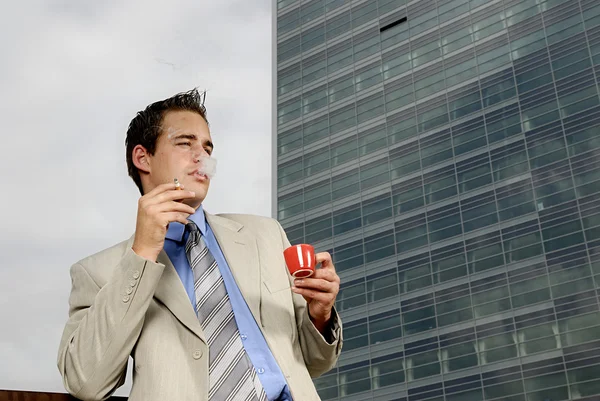 Businessman drinking coffee — Stock Photo, Image