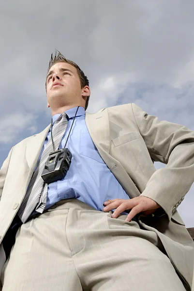 Young businessman with camera — Stock Photo, Image