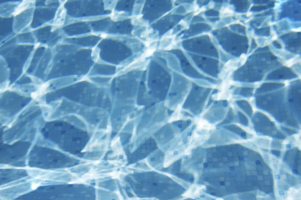 Abstract spel van licht onderaan zwembad — Stockfoto