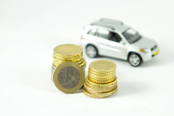 Vehicle and coins — Stock Photo, Image
