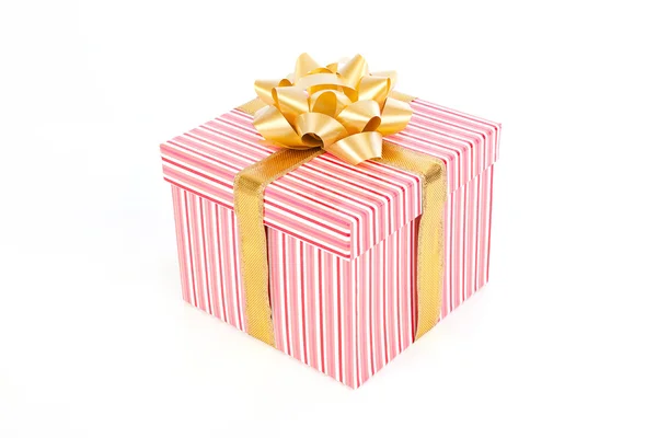 Single pink striped gift box with gold ribbon — Stock Photo, Image