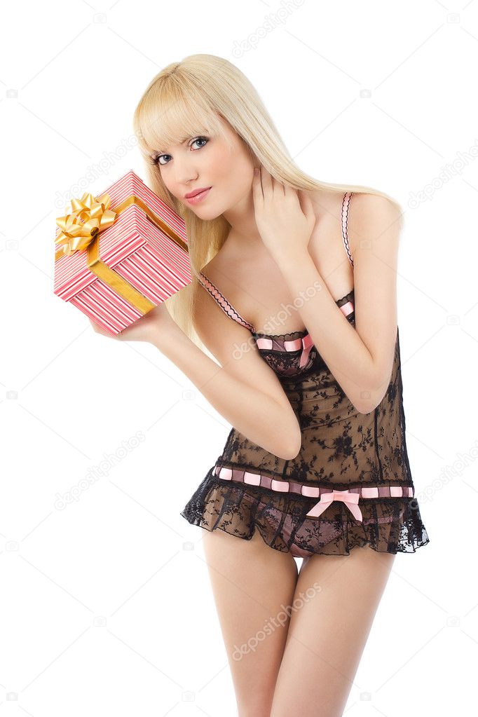 Gorgeous girl in sexy pink lingerie with gift box