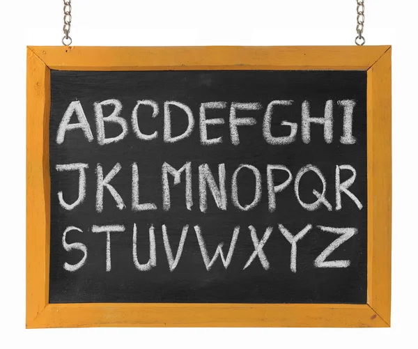 Letras do alfabeto inglês maiúsculas maiúsculas no quadro negro — Fotografia de Stock