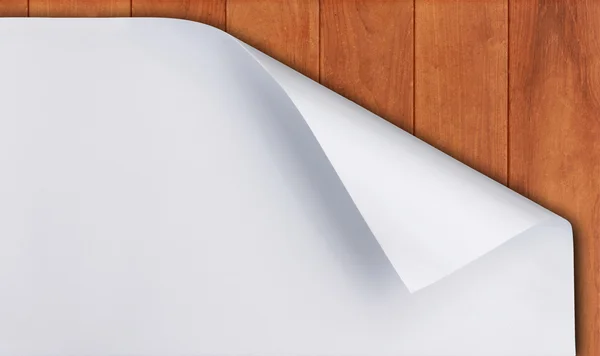 Papierrolle auf Holz Hintergrund — Stockfoto