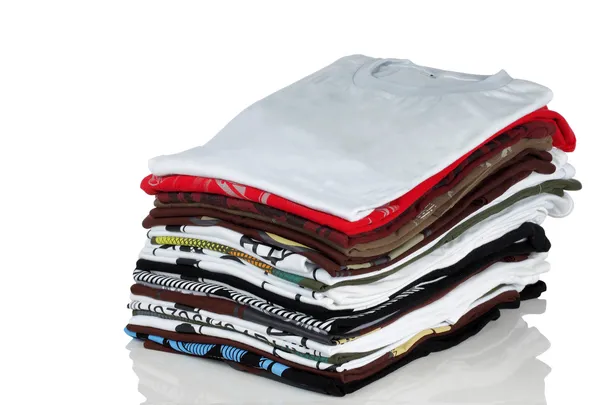 Stack of t-shirt and clothes — Stock Photo, Image