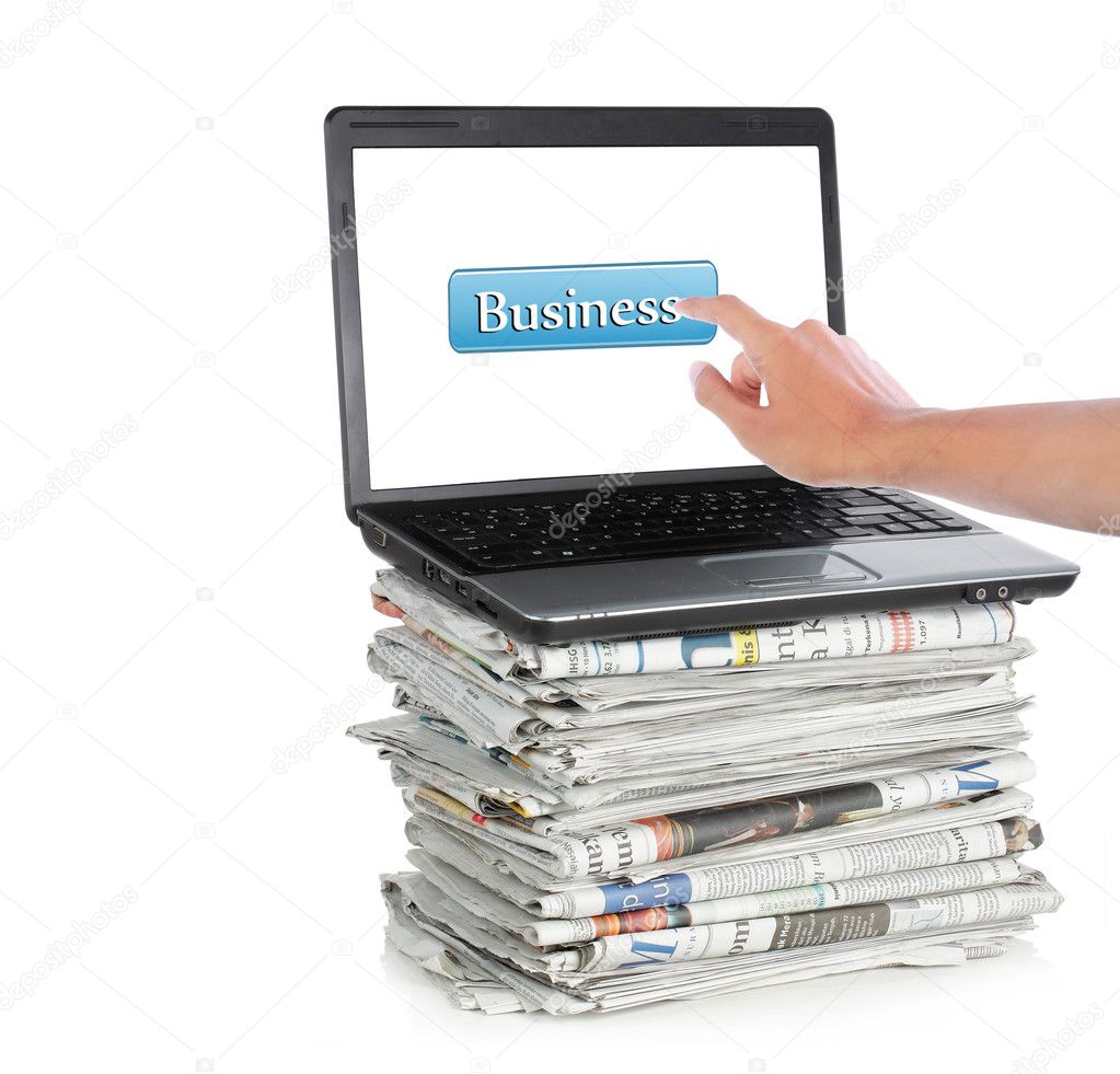 Business icon of laptop and newspaper