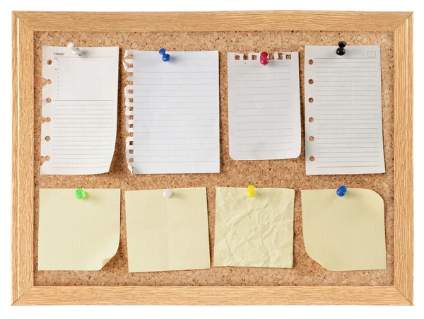 Collection of note papers on cork board — Stock Photo, Image