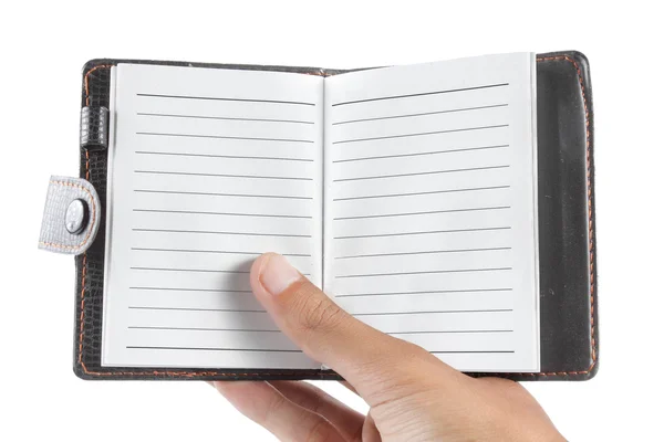 Hand met een notebook — Stockfoto