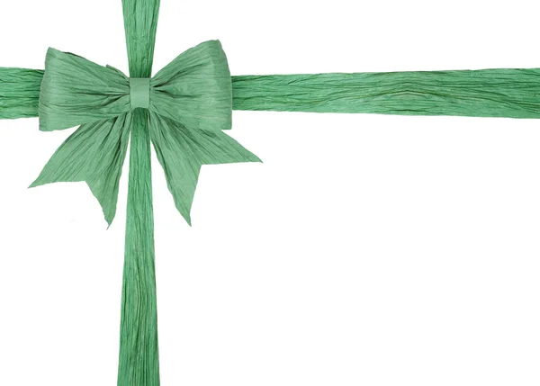 Зелена стрічка з бантом на білому — стокове фото