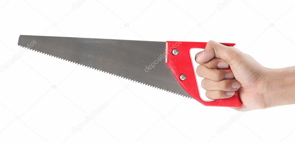 Hand using saw
