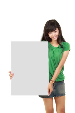 Beautiful woman holding empty white board