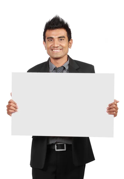 Bonito empresário segurando uma placa em branco — Fotografia de Stock