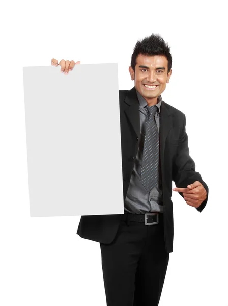 Empresario sosteniendo un cartel en blanco —  Fotos de Stock