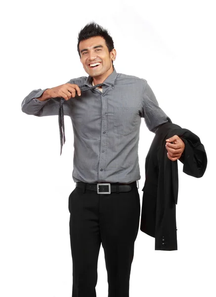 Young businessman untying his tie — Stock Photo, Image