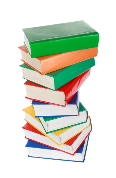 Pilha de livros coloridos isolados em branco — Fotografia de Stock
