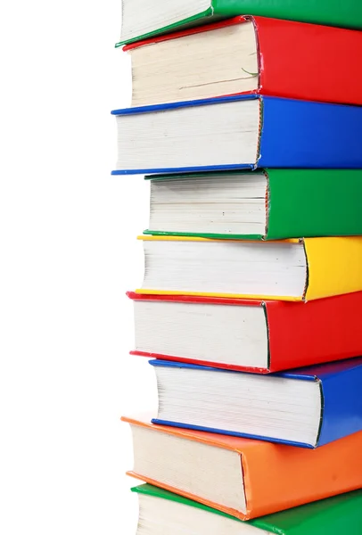 Een stapel van vele kleurrijke boeken — Stockfoto
