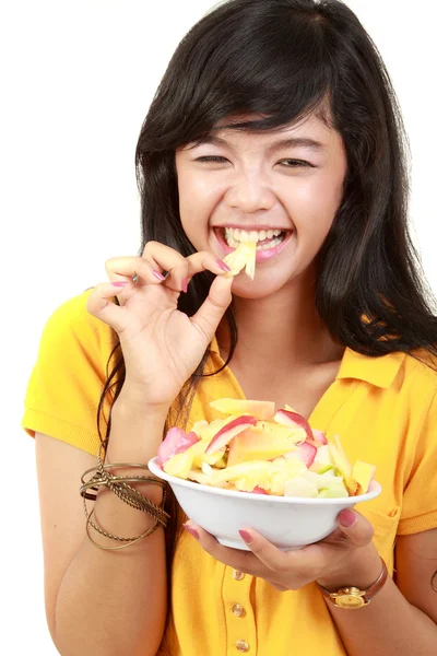 Beauty, young girl holding fruit salad Stock Image
