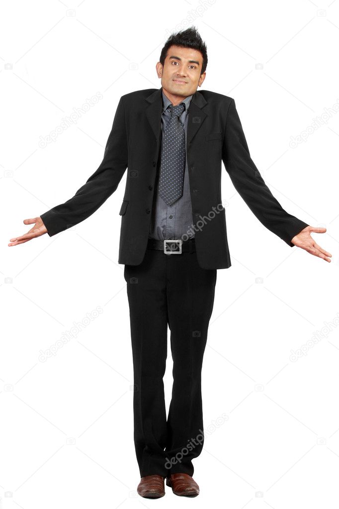 Portrait of businessman gesturing do not know sign