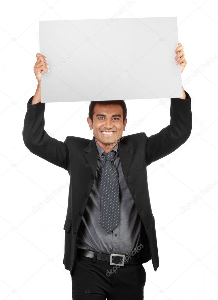 Young Businessman holding a blank sign
