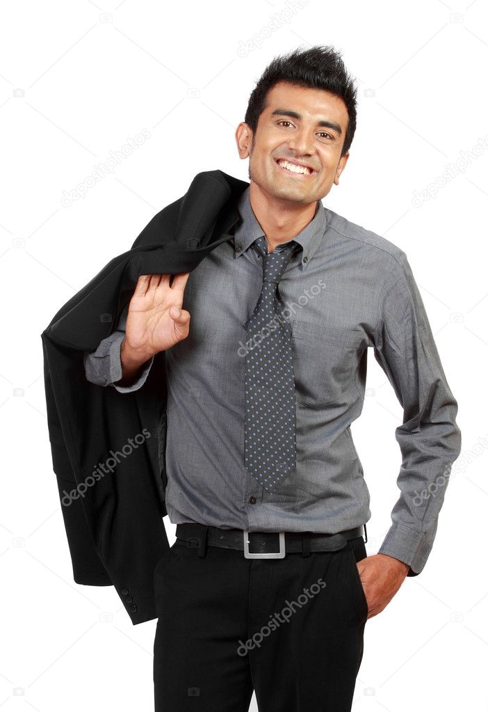 Happy young businessman standing