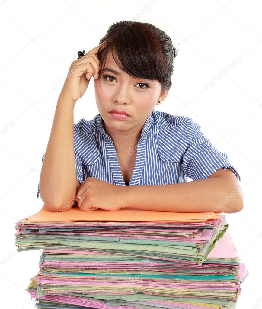 Young woman stressed at work