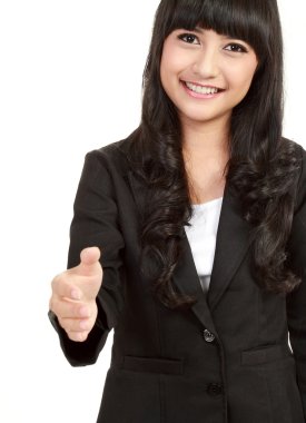 Young happy business woman giving hand for handshake clipart