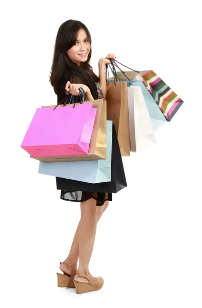 Menina feliz com sacos de compras — Fotografia de Stock