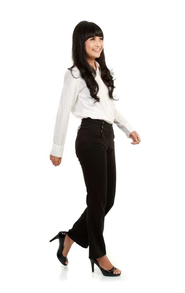 Full body portrait of walking businesswoman — Stock Photo, Image