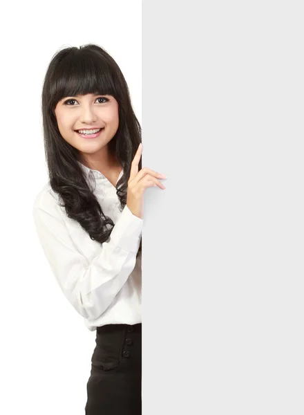 Businesswoman holding a blank presentation board — Stock Photo, Image