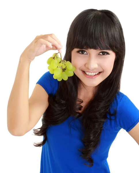 Beautiful woman holds grapes — Stock Photo, Image